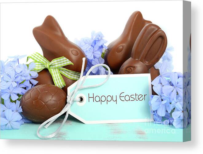Blue Canvas Print featuring the photograph Happy Easter chocolate bunny by Milleflore Images