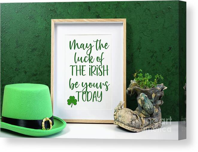 St Patrick Canvas Print featuring the photograph Happy St Patrick's Day wood border picture frame. by Milleflore Images