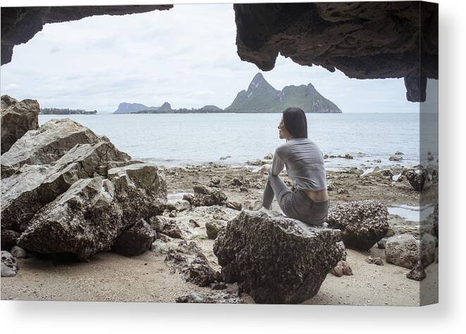 Adriatic Sea Canvas Print featuring the photograph Happy Young Asian Woman Sitting On A Rock by IttoIlmatar
