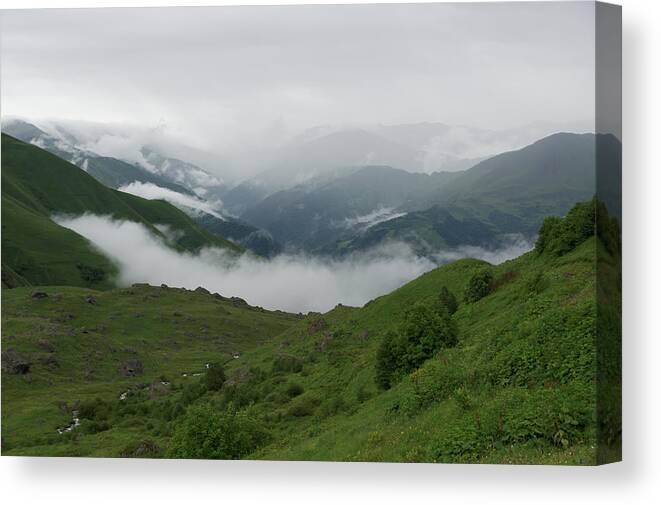 Scenics Canvas Print featuring the photograph Heavy clouds over Abudelauri Valley, Caucasus Mountains, Georgia by Vyacheslav Argenberg