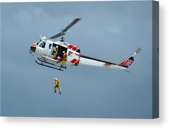 Wind Canvas Print featuring the photograph Helicopter Rescue Series by Leezsnow