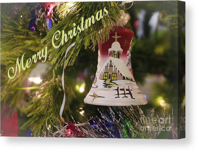 Merry Canvas Print featuring the photograph handblown glass Holiday Bell by Darrell Foster