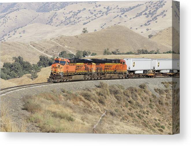 Hotshot Canvas Print featuring the photograph Hotshot -- BNSF ES44AC and ES44C4 Pulling an Intermodal Train in the Tehachapi Mountains, California by Darin Volpe