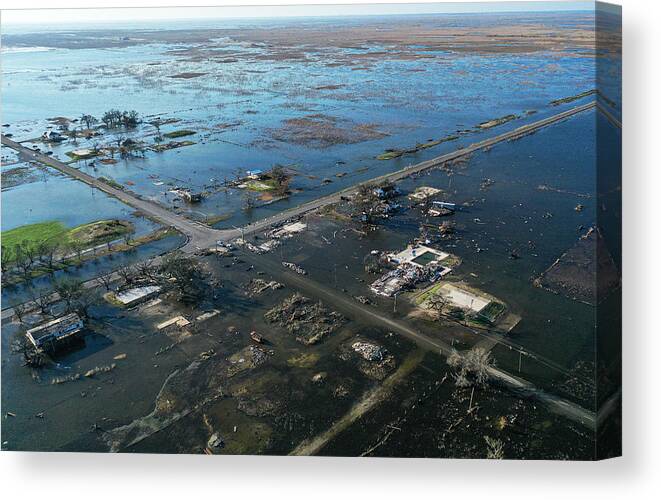 Social Issues Canvas Print featuring the photograph Hurricane Delta causes damage to Louisiana's Gulf Coast by E4c
