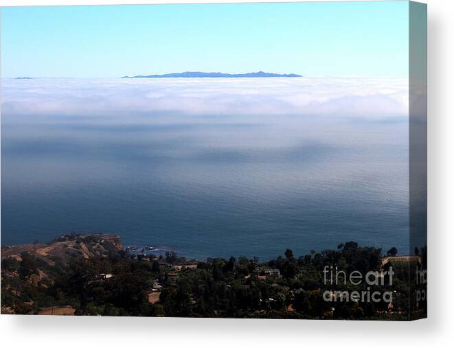 Clouds Canvas Print featuring the photograph Island in the Sky by Katherine Erickson