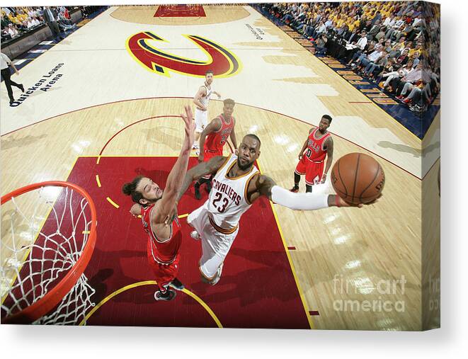 Chicago Bulls Canvas Print featuring the photograph Joakim Noah and Lebron James by Nathaniel S. Butler