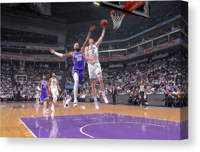 Nba Pro Basketball Canvas Print featuring the photograph Joe Ingles and Willie Cauley-stein by Rocky Widner