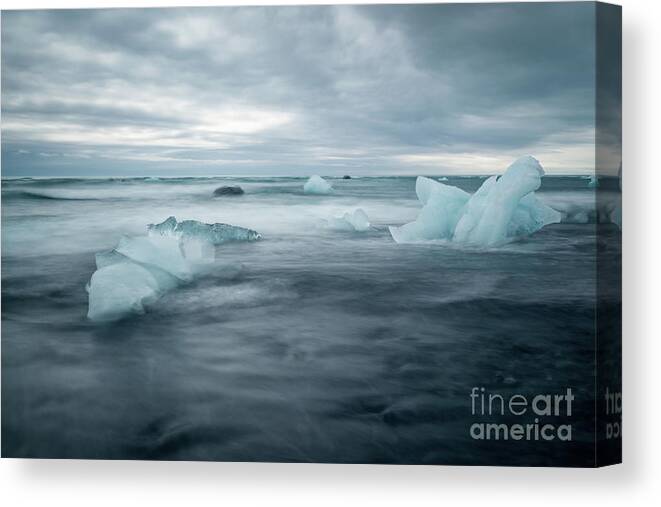 Iceland Canvas Print featuring the photograph Jokulsarlon Diamond beach, Iceland by Delphimages Photo Creations