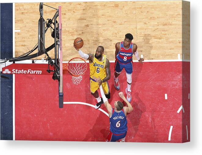 Nba Pro Basketball Canvas Print featuring the photograph Karl Malone and Lebron James by Stephen Gosling