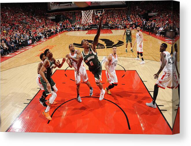 Eric Bledsoe Canvas Print featuring the photograph Kawhi Leonard and Eric Bledsoe by Ron Turenne