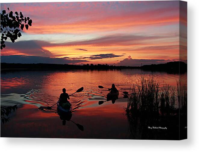 Kayaks At Beautiful Nimisila Reservoir In The City Of Green Canvas Print featuring the photograph Kayaks at Red Sunset by Mary Walchuck