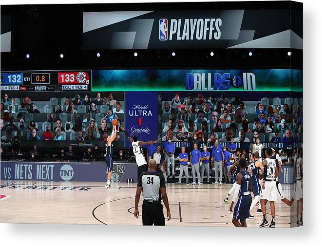 Luka Doncic Canvas Print featuring the photograph LA Clippers v Dallas Mavericks - Game Four by Joe Murphy