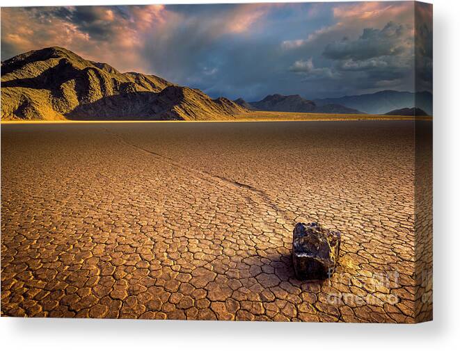 Sliding Rock Canvas Print featuring the photograph Last light on the Grandstand, Racetrack Playa, Death Valley, California by Neale And Judith Clark