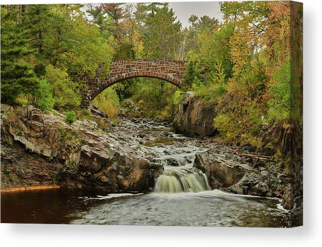 Water Canvas Print featuring the photograph Lester river bridge by Paul Freidlund