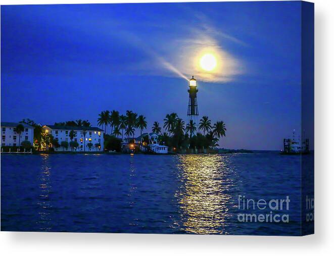 Lighthouse Canvas Print featuring the photograph Light Beams and Moonrise by Tom Claud