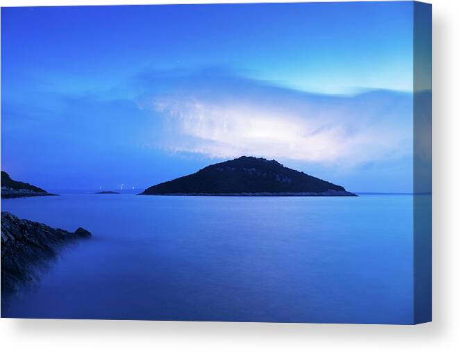 Losinj Canvas Print featuring the photograph Lightning at dawn over Veli and Mali Osir islands on Losinj, Cro by Ian Middleton