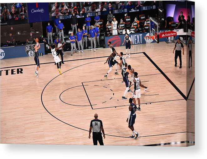 Luka Doncic Canvas Print featuring the photograph Los Angeles Clippers v Dallas Mavericks - Game Four by David Dow