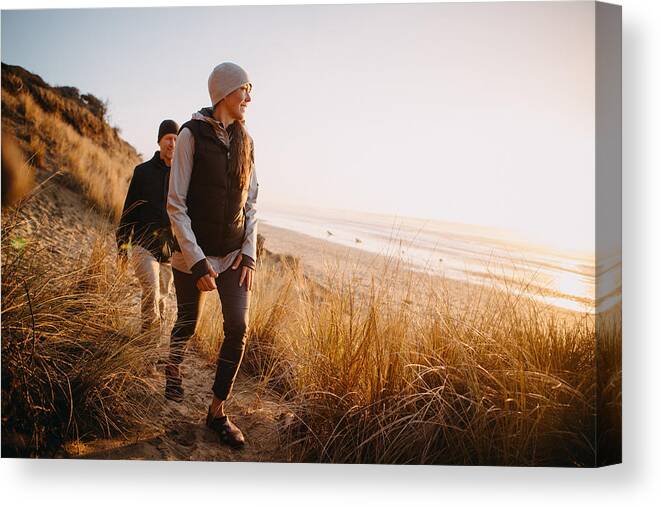 Mature Adult Canvas Print featuring the photograph Loving Mature Couple Hiking At Oregon Coast by RyanJLane