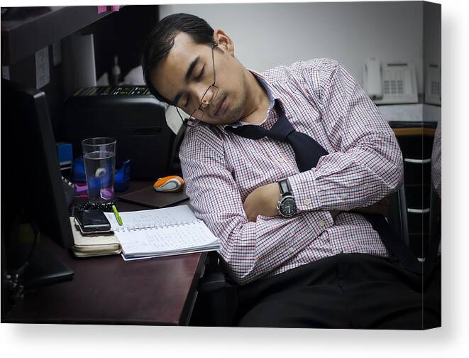 People Canvas Print featuring the photograph Man sleep on office by Yasser Chalid