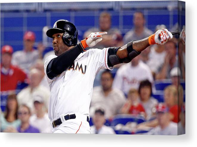 American League Baseball Canvas Print featuring the photograph Marcell Ozuna by Rob Foldy