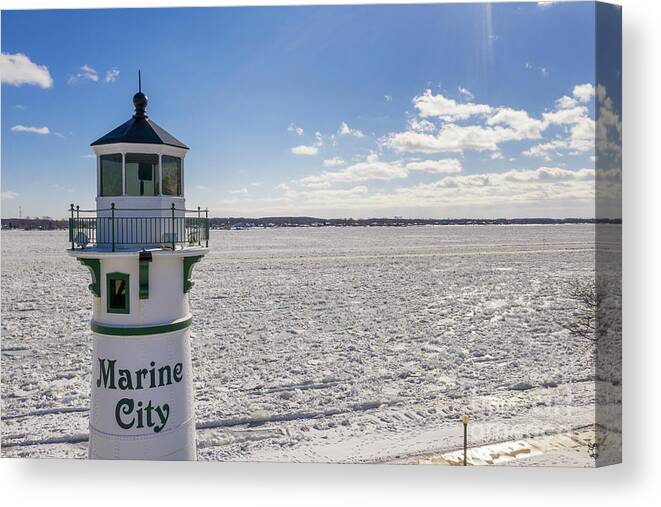 Winter Canvas Print featuring the photograph Marine City Lighthouse by Jim West