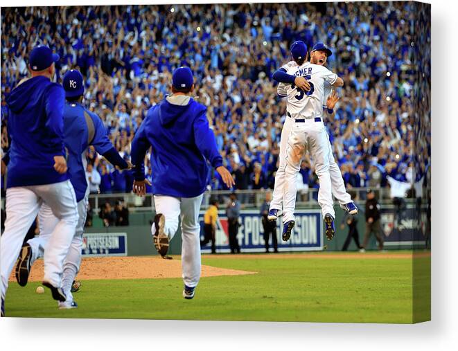 American League Baseball Canvas Print featuring the photograph Mike Moustakas and Eric Hosmer by Jamie Squire