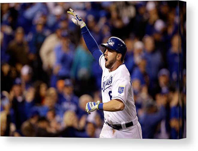 Celebration Canvas Print featuring the photograph Mike Moustakas by Ezra Shaw