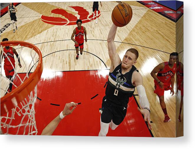 Nba Pro Basketball Canvas Print featuring the photograph Milwaukee Bucks v Toronto Raptors by Scott Audette