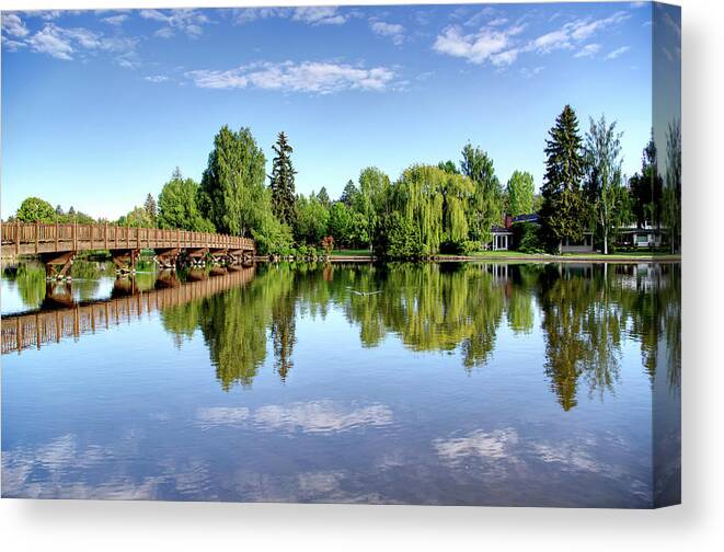 Water Canvas Print featuring the photograph Mirror Pond by Loyd Towe Photography