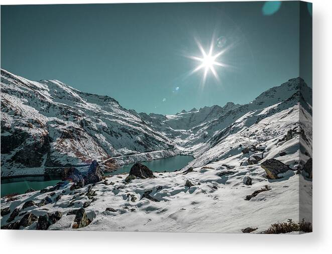 Glacier Canvas Print featuring the photograph Mountain lake and snow-capped mountains in Valais, Switzerland. by Benoit Bruchez