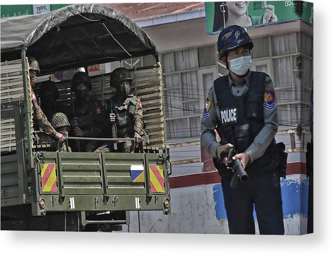 Myanmar Canvas Print featuring the photograph Myanmar armed forces prepare to crakcdown the anti-coup protests by Robert Bociaga