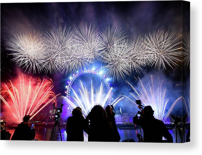 Fireworks Canvas Print featuring the photograph New Years Eve Fireworks by Andrew Lalchan