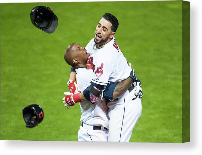 American League Baseball Canvas Print featuring the photograph Nyjer Morgan and Mike Aviles by Jason Miller