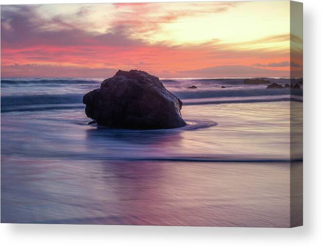 Coastal Sunset Canvas Print featuring the photograph Ocean Swirling Around a Rock at Sunset by Matthew DeGrushe