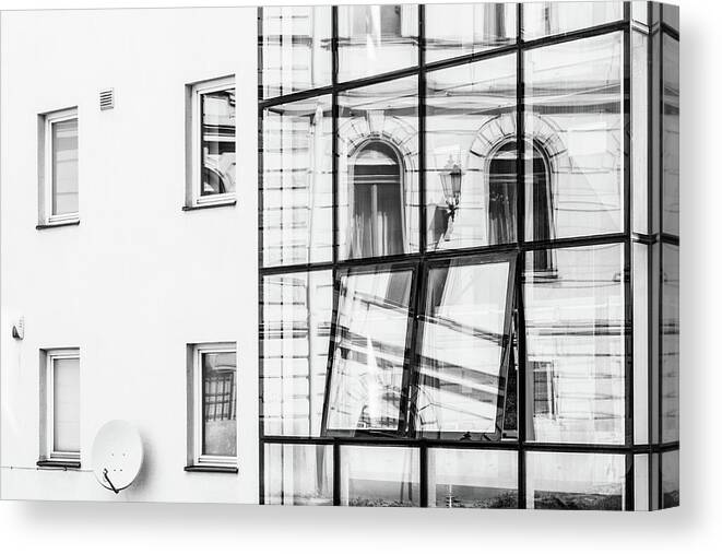 Building Canvas Print featuring the photograph Old town hall reflected in modern glass wall by Viktor Wallon-Hars