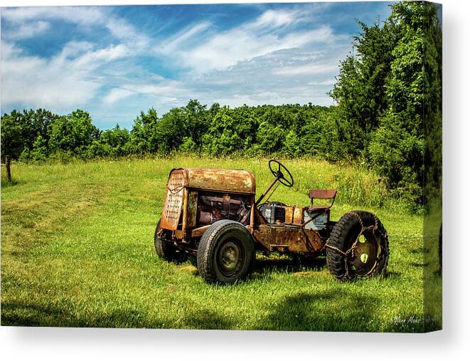 Old Tractor Canvas Print featuring the photograph Old Tractor by GLENN Mohs