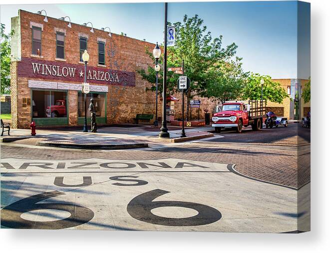 Adamson Canvas Print featuring the photograph On The Corner in Winslow Arizona by Paul LeSage