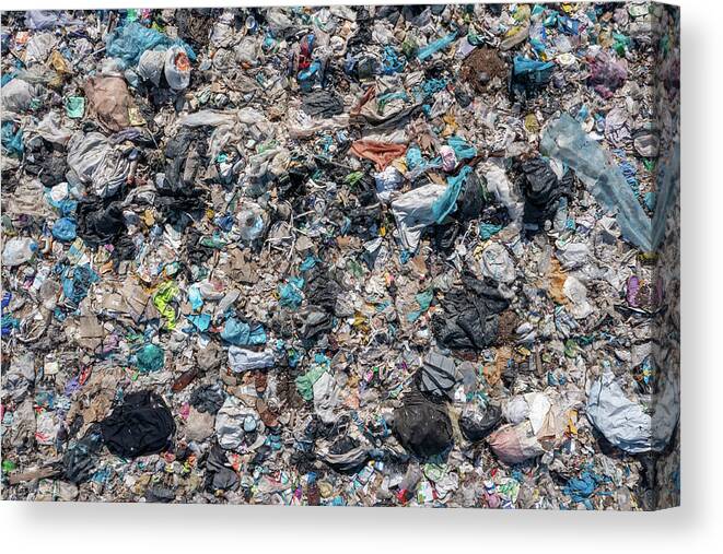 Garbage Canvas Print featuring the photograph Open storage of solid waste garbage by Mikhail Kokhanchikov