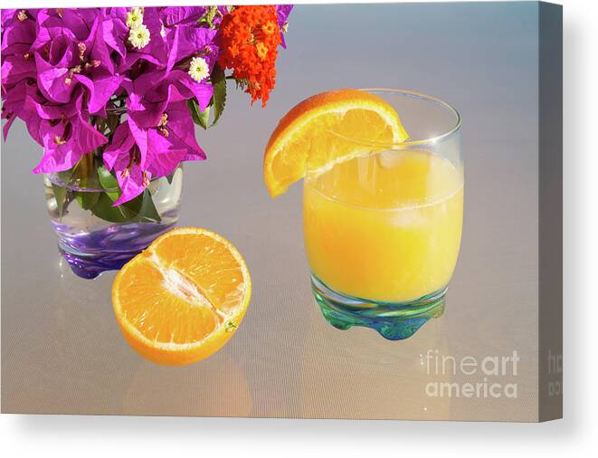 Orange Canvas Print featuring the photograph Orange and tangerine fruit juice in the sunshine by Adriana Mueller