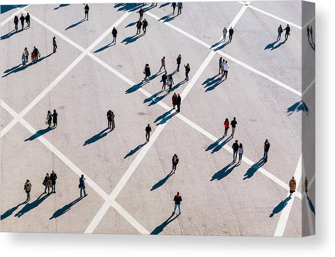 Shadow Canvas Print featuring the photograph People walking at the town square on a sunny day by Alexander Spatari