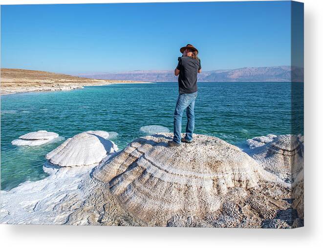 The Dead Sea Canvas Print featuring the photograph Photographer at the Dead Sea by Dubi Roman