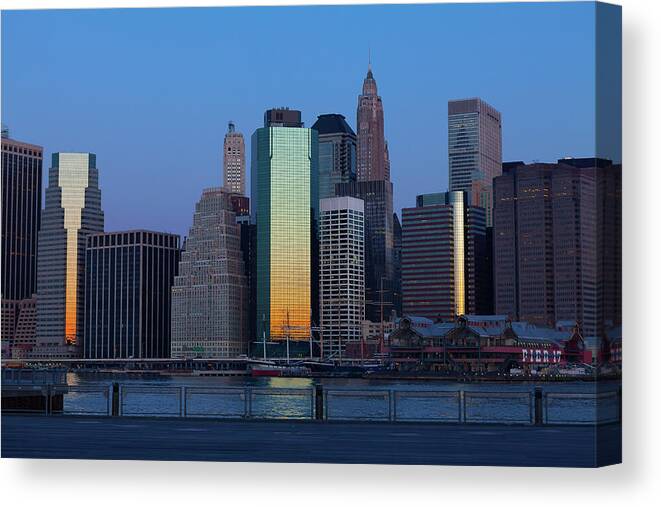 Skyline Canvas Print featuring the photograph Pier 17 and lower Manhattan at dawn by David Smith