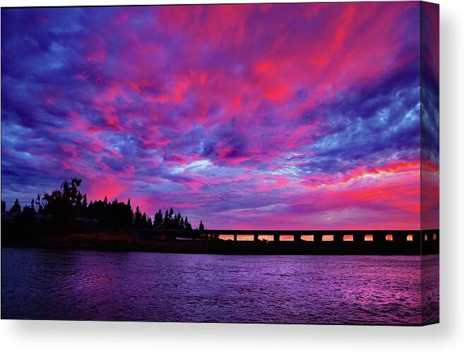 Pink Sunset Canvas Print featuring the photograph Pink Rolling Clouds Sunset by Marilyn MacCrakin