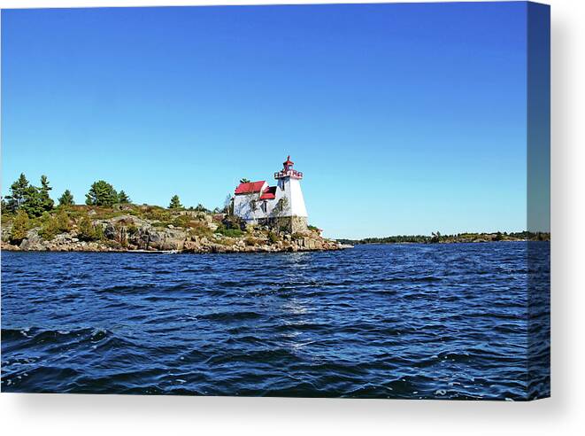 Pointe Au Baril Canvas Print featuring the photograph Pointe Au Baril Lighthouse by Debbie Oppermann