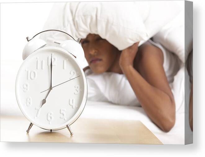 Number 7 Canvas Print featuring the photograph Portrait of alarm clock and upset woman in the background by RuslanDashinsky