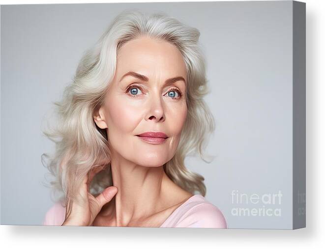 Woman Canvas Print featuring the painting Premium Premium Gorgeous 50s Mid Aged Mature Woman Looking At Camera Isolated On White Mature Old Lady Close Up Portrait Healthy Face Skin Care Beauty Middle Age Skincare Cosmetics Cosmetology Concept by N Akkash