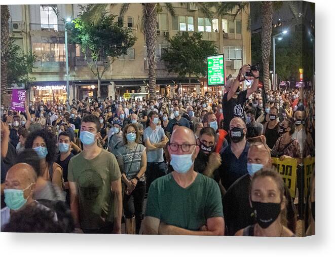 Tel Aviv Canvas Print featuring the photograph Protest against the Government 1 by Dubi Roman