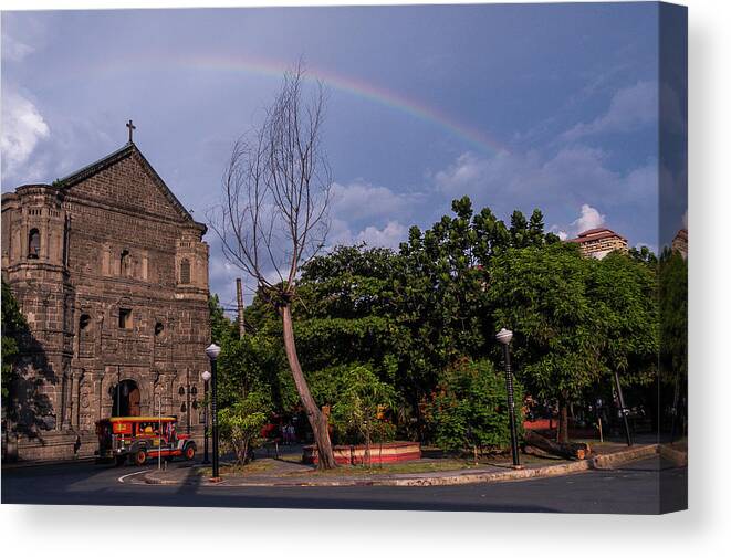 Rainbow Canvas Print featuring the photograph Rainbow over Malate Church by Arj Munoz
