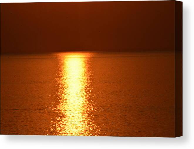 Tranquility Canvas Print featuring the photograph Red sunset view at sea by Karin Broholm / FOAP