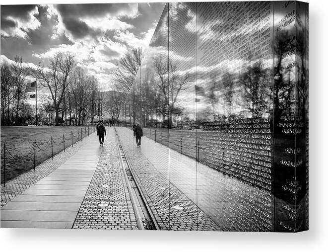 Vietnam Veterans Memorial Canvas Print featuring the photograph Reflections Upon The Wall by Susan Rissi Tregoning